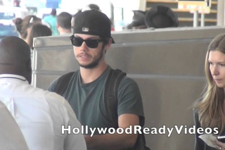 Exclusive: Dylan O’Brien arrives at LAX airport in LA for a departing flight to NYC