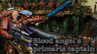 Blood Angel's Primaris Captain with  sword.