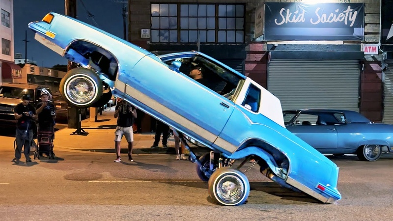 Lowrider Cars Hopping Bouncing Cruising in Downtown Los Angeles California Classic Car